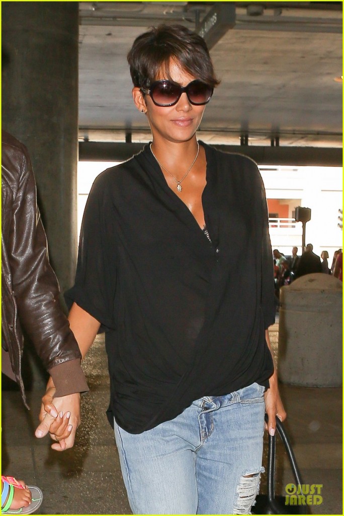 Oh look, it's Halle Berry in a simple blouse, ripped jeans and sunglasses. Easy!